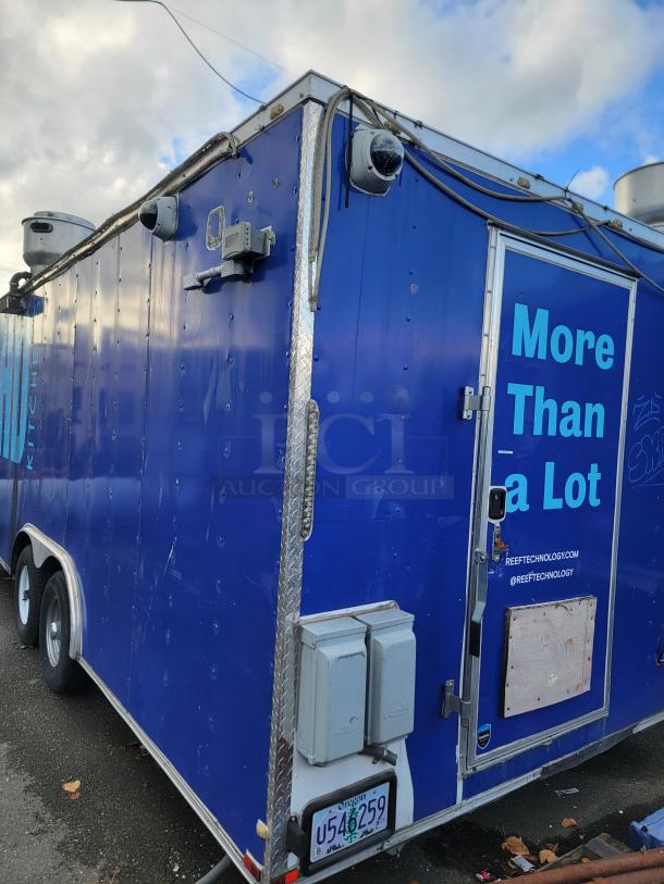 2019 Quality 24' food trailer, blue exterior, with external wiring and Oregon license plate. Clean condition, ideal for customization.