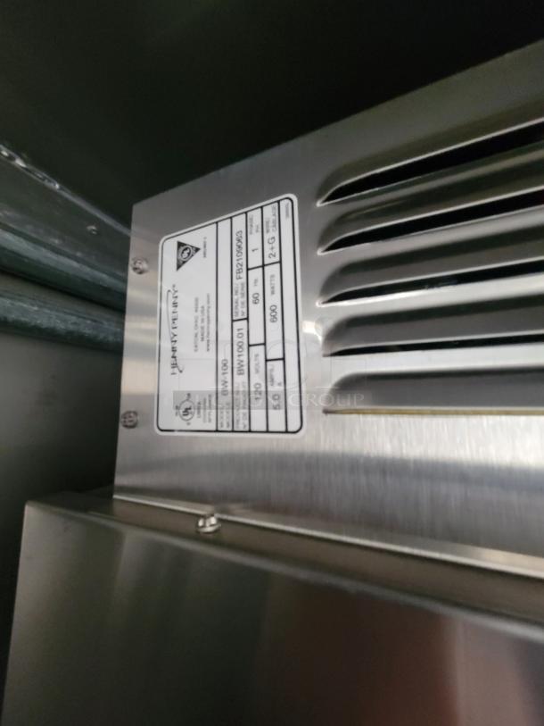 Henny Penny BW-100 Bun Warmer label details: 120V, 5.0 Amps, 600 Watts, Model BW100.01. Stainless steel design.