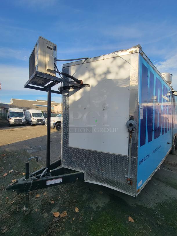 2019 Quality 24' food trailer exterior, showing air conditioning unit. Mobile kitchen ready for operation, features commercial appliances.