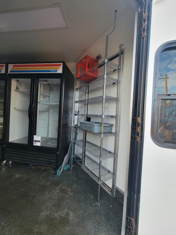 2021 SDG 20' Mobile Ghost Kitchen Trailer, dual-axle, commercial fridge, shelving, ready for high-volume order fulfillment.