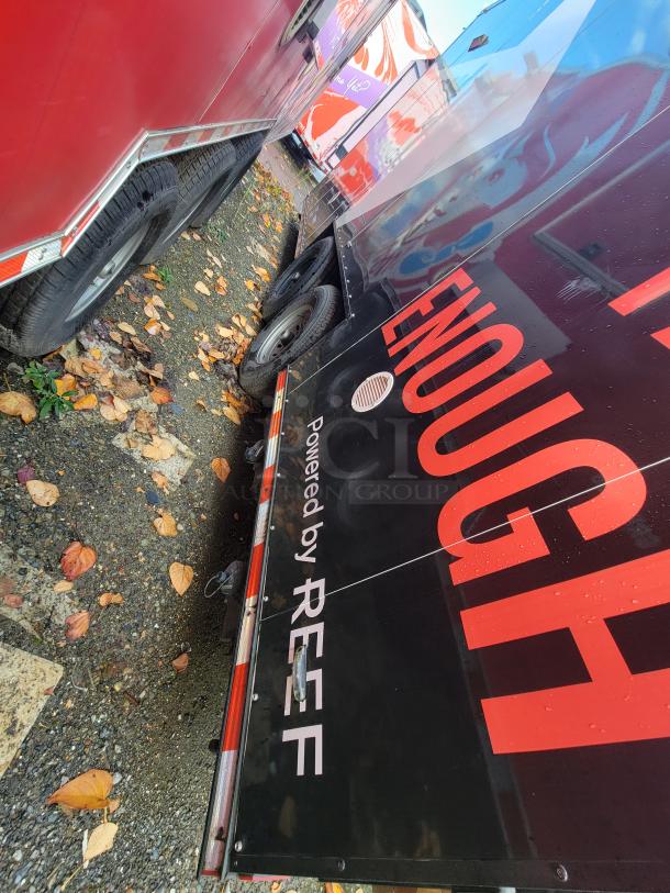 2021 SDG 20' mobile ghost kitchen trailer, dual-axle, with "Powered by REEF" signage. Suitable for high-volume delivery.