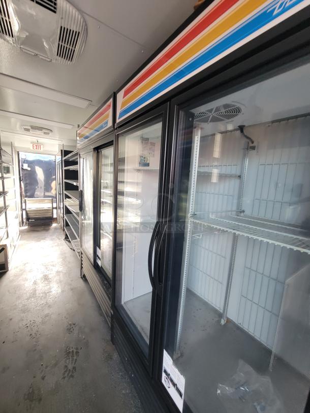 2021 SDG 20' mobile ghost kitchen trailer with commercial equipment, dual-axle, excellent condition, ideal for deliveries.