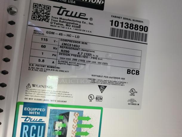 Label on a True Refrigeration unit. Model: GDM-45-HC-LD, Serial: 10138890, voltage: 115V, refrigerant: R290. Safety warnings included.