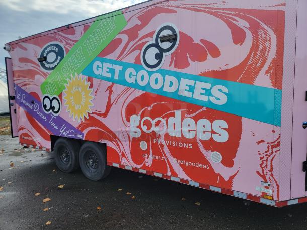 2021 SDG Ghost 20' food trailer with vibrant branding, dual axle, and 'goodees' logo. Fully equipped mobile kitchen.