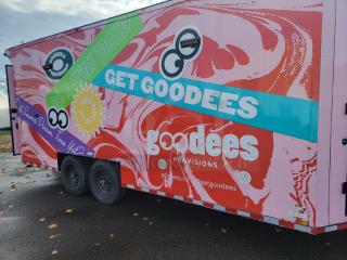 2021 SDG Ghost 20' food trailer with vibrant branding, dual axle, and 'goodees' logo. Fully equipped mobile kitchen.