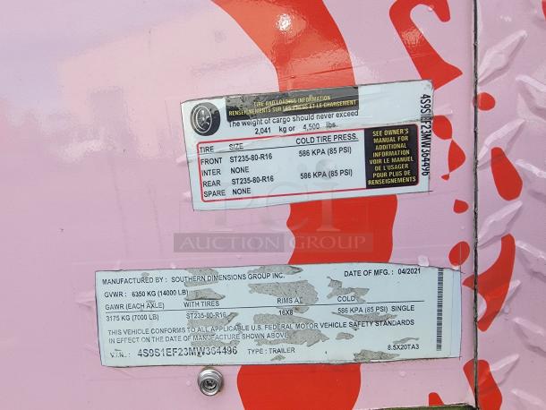 2021 SDG Ghost Food Trailer label showing tire and weight specs, manufactured by Southern Dimensions Group in April 2021.