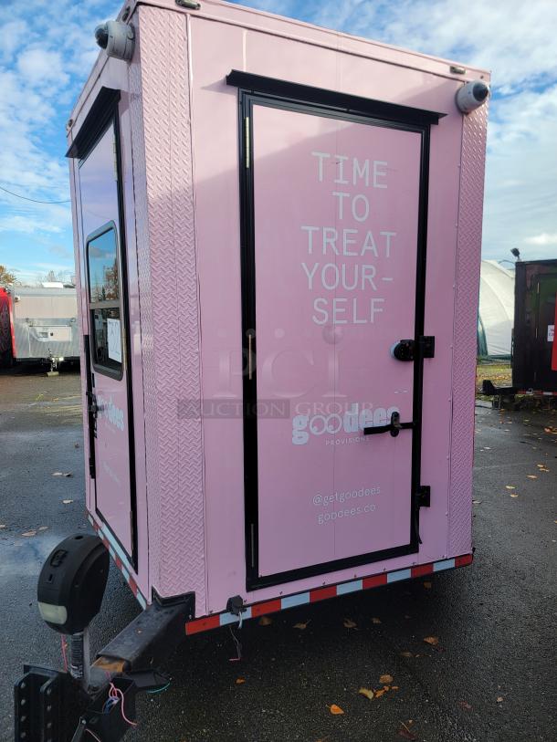 2021 SDG Ghost 20ft pink food trailer, fully equipped with refrigeration and plumbing, labeled "Time to Treat Yourself.”