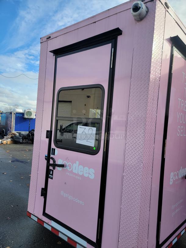 2021 SDG Ghost 20' food trailer, pink exterior, "goodees provisions" branding, fully equipped, high-efficiency refrigeration.