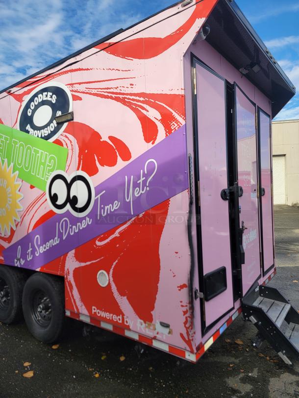 2021 20' SDG Ghost Food Trailer. Pink and red graphics, "GOODEES PROVISIONS" logo. Fully equipped for immediate operation.