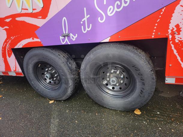 2021 SDG Ghost 20' Food Trailer, colorful exterior, dual Goodyear tires, ready for immediate operation.