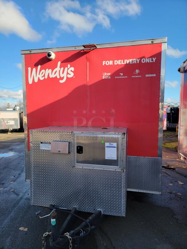 2021 Rock Solid Cargo 28' mobile kitchen trailer, red with Wendy's branding. Fully equipped for commercial food service.
