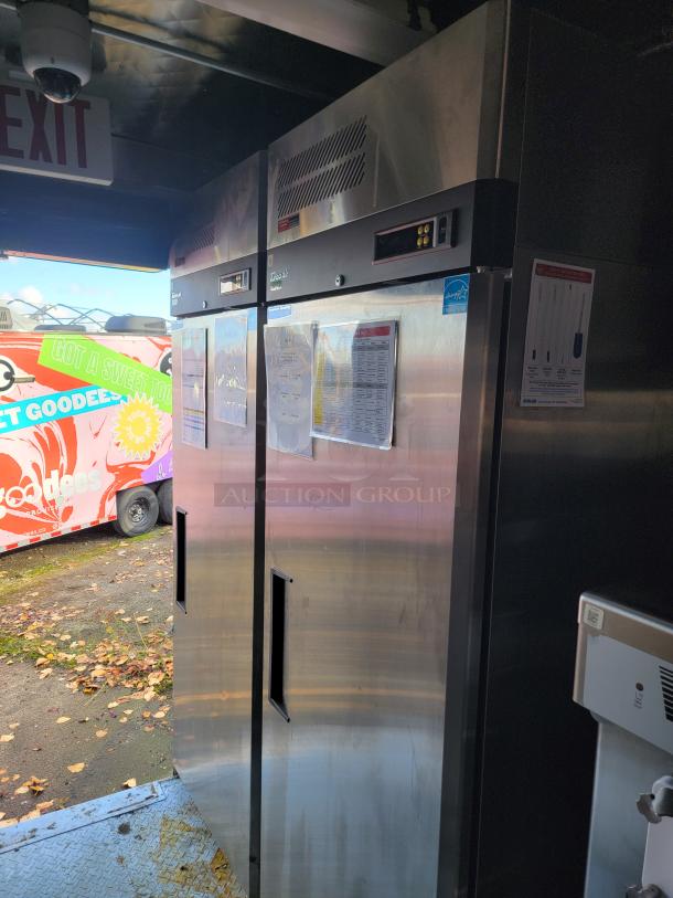 2021 Rock Solid Cargo 28' Mobile Kitchen Trailer with commercial Turbo Air refrigeration units inside.