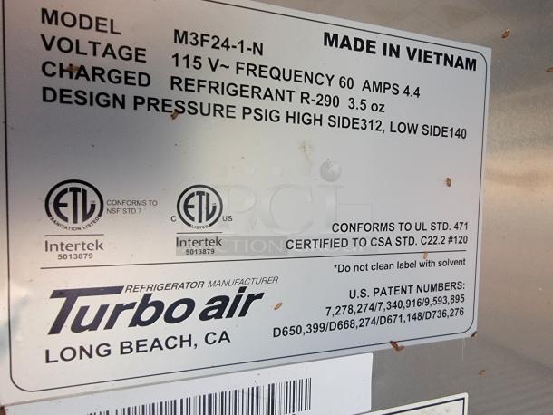 Label on a Turbo Air refrigerator indicates model M3F24-1-N, 115V, charged with R-290 refrigerant. Conforms to NSF and UL standards. Made in Vietnam.