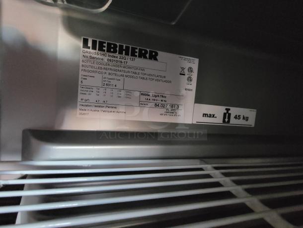 Liebherr bottle cooler label with model GRB0551HC index 22Q/137, made in Austria, capacity 47 L. Max weight: 45 kg.