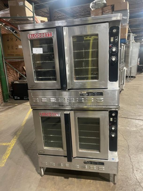 Blodgett stainless steel double stacked convection oven, electric powered, thermostatic control, wired oven rack, on legs.