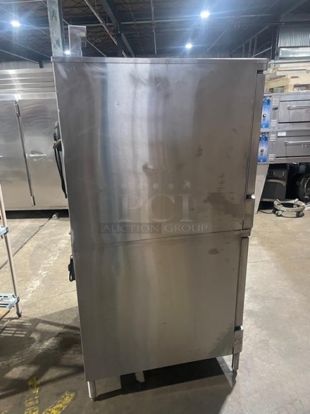 Blodgett commercial stainless steel double-stacked convection oven on legs, thermostatic control, wired oven rack, used condition.