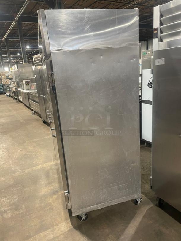 Continental Commercial Stainless Steel 3-Door Freezer, Model 3F. Energy Star Certified, on casters, with wire rack.