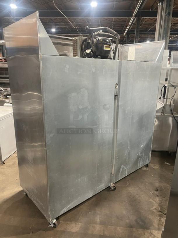 Continental 3F stainless steel 3-door reach-in freezer, Energy Star certified, with poly-coated wire rack, on casters.