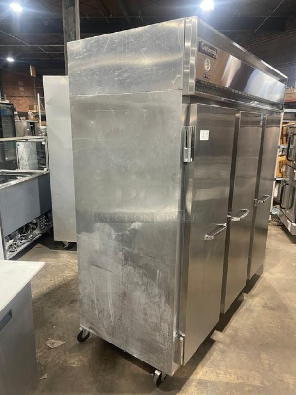 Continental Commercial 3 Door Reach-In Freezer, Model 3F, stainless steel, Energy Star Certified, on casters, with poly coated wire rack.