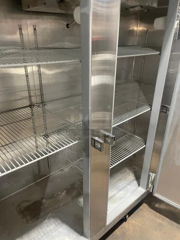 Continental Model 3F stainless steel 3-door reach-in freezer, Energy Star certified, with poly coated wire racks, on casters.