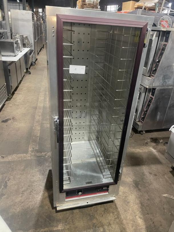 Carter-Hoffman stainless steel electric food warmer, model HL3-18-35, full height, on casters, with pan holding rack.