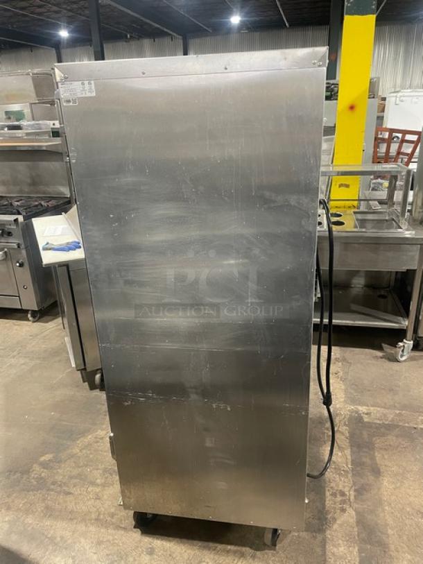 Carter-Hoffman stainless steel electric full-height heating/proofing cabinet, model HL3-18-35, with built-in pan rack, on casters.