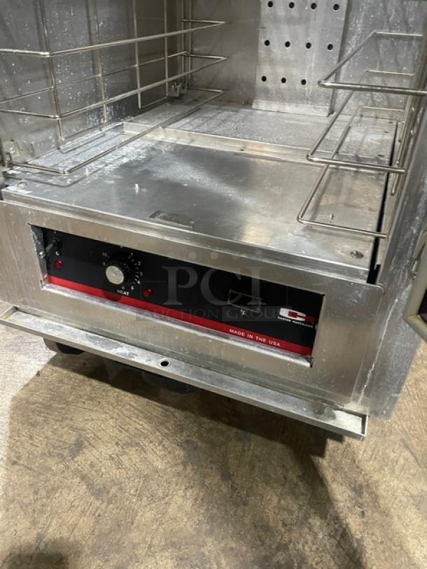 Carter-Hoffman stainless steel heating/proofing cabinet, model HL3-18-35, with built-in pan rack, on casters, 120V, 1 phase.