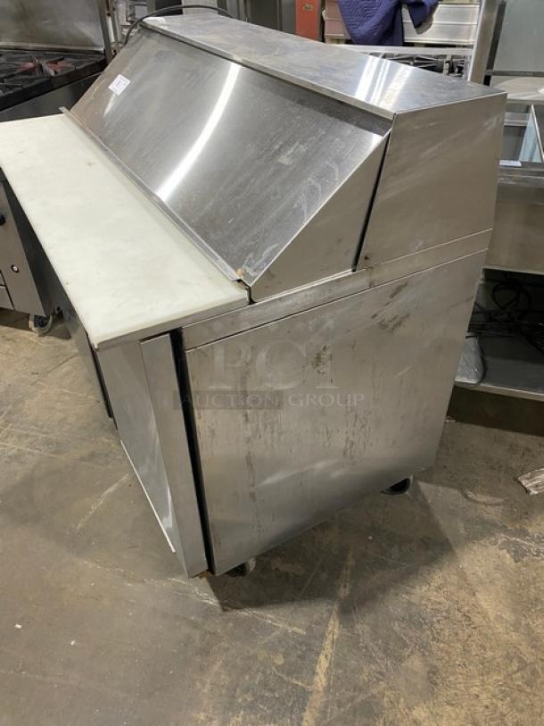 Silver King stainless steel 2-door refrigerated prep table, Model SKEPT4812SD1BM, with cutting board and wire rack. Used.