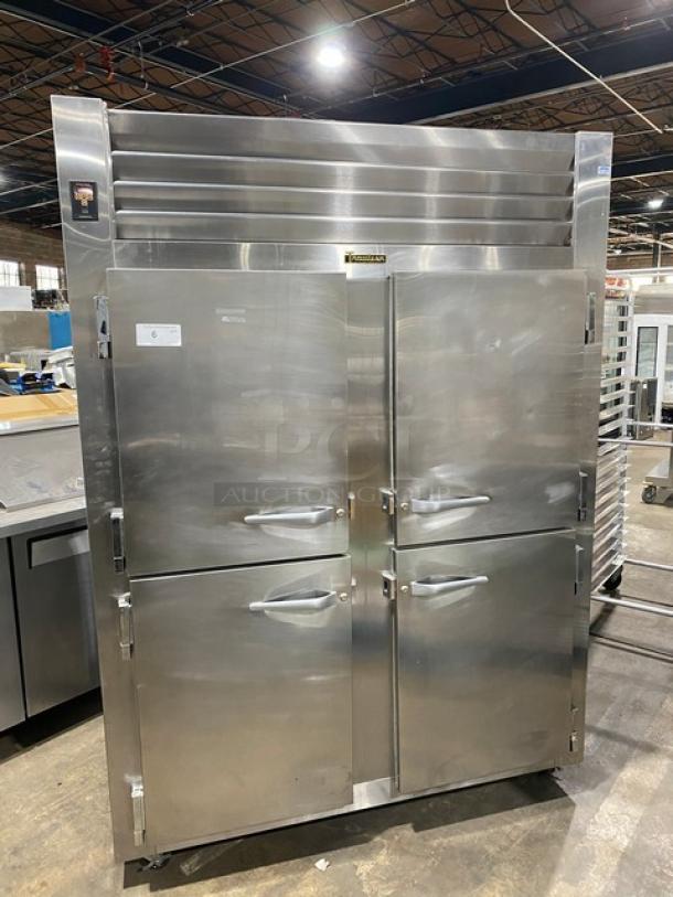 Traulsen Spec Line stainless steel half-door reach-in refrigerator, model AHT232WUTHHS, on casters, with chrome racks.