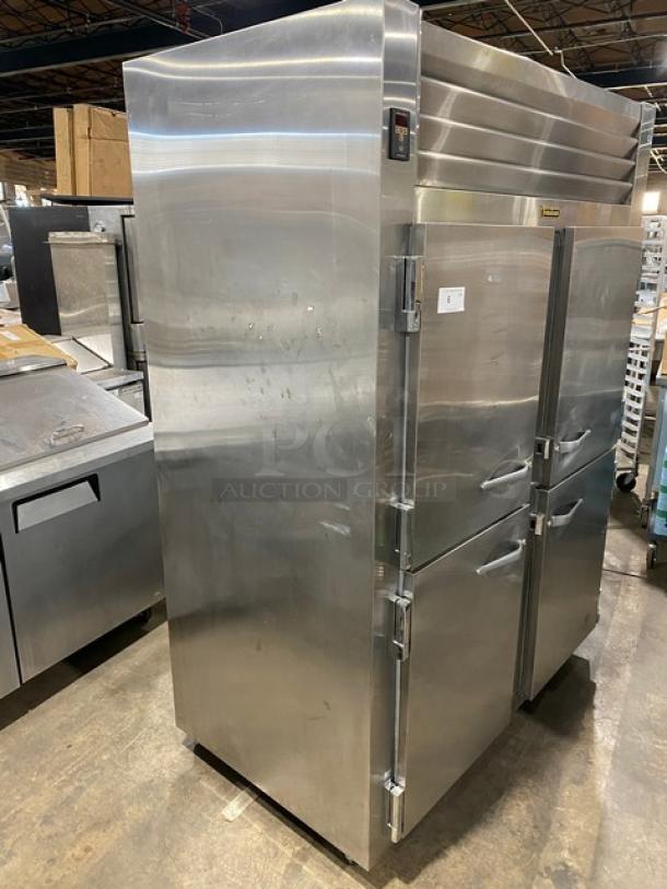 Traulsen Spec Line stainless steel half-door double section reach-in refrigerator, model AHT232WUTHHS, on casters.