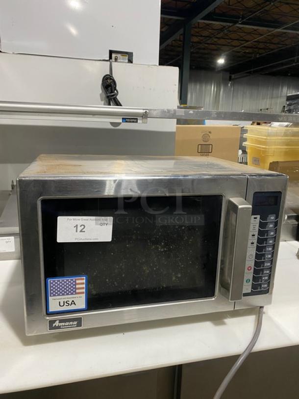 Amana 2021 commercial stainless steel microwave, model RCS10TS. Stackable with digital push control, 120V. Used condition.