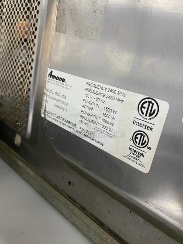Amana 2021 commercial stainless steel microwave, model RCS10TS, with digital push control. ETL certified, 120V, SN 2104141214.