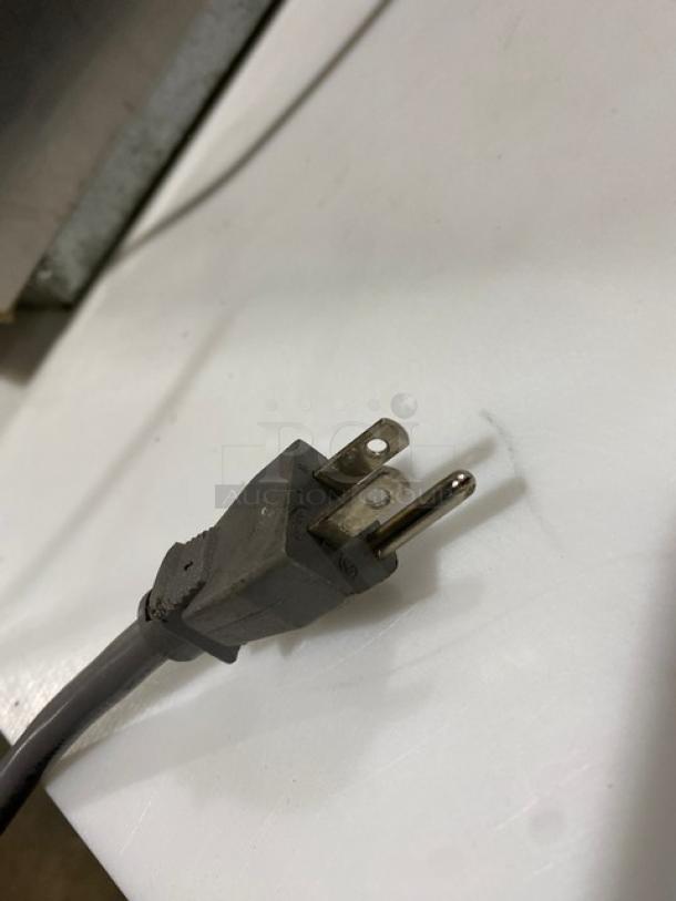 Plug for Amana RCS10TS commercial microwave oven, suitable for 120V power. Features durable material and standard prongs.