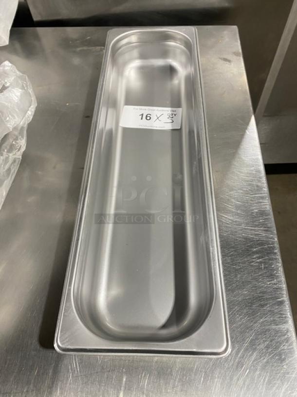 Choice 1/2-size long steamtable pan, Model 4070522, stainless steel, 2.5" deep, anti-jam. New condition. Tag reads "16 X".