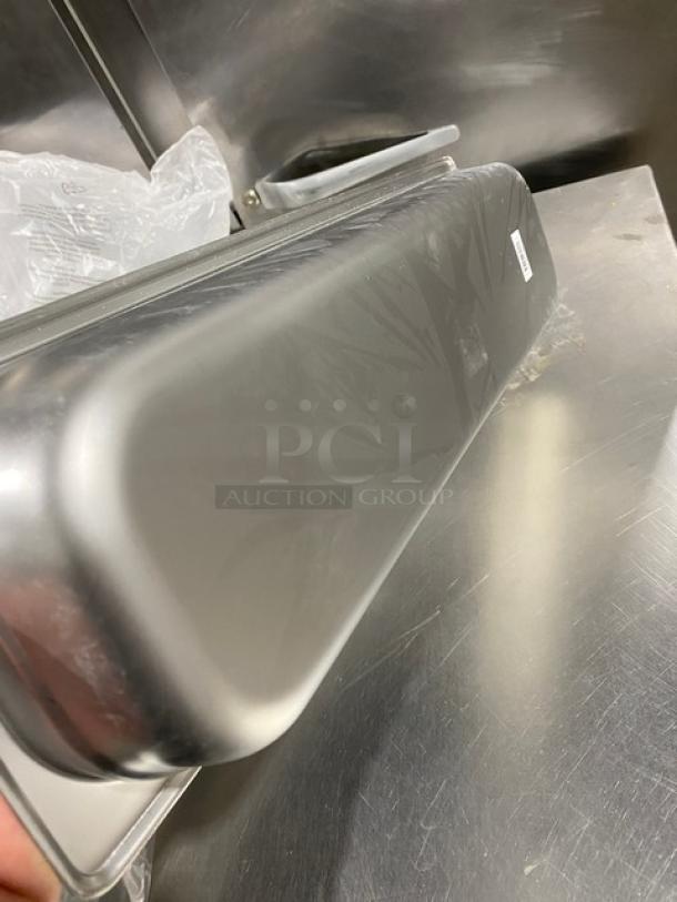 Choice Commercial stainless steel steamtable pan, model 4070522, 1/2-size long, 2.5" deep, new condition, anti-jam design.