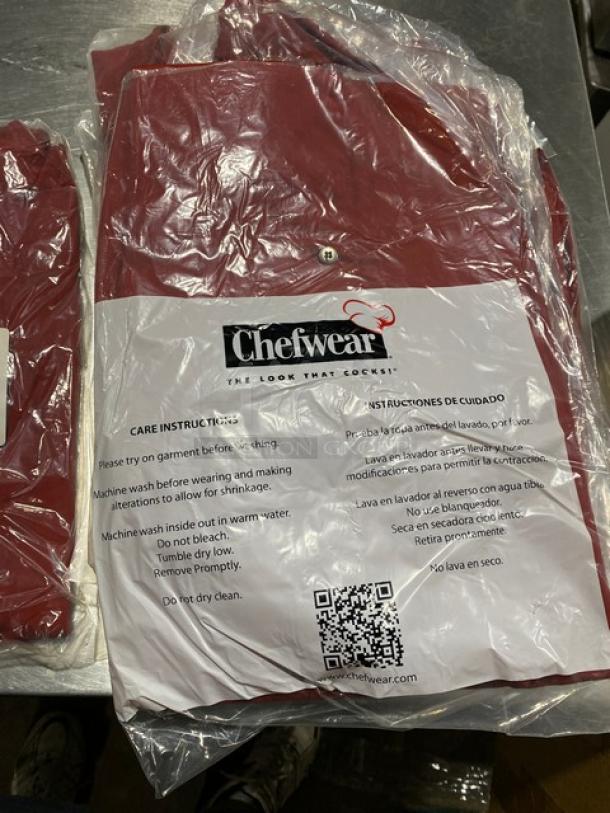 Brand new Chefwear red polyester/cotton blend bar shirt, Model 1310, size 2X, in original packaging with care instructions.
