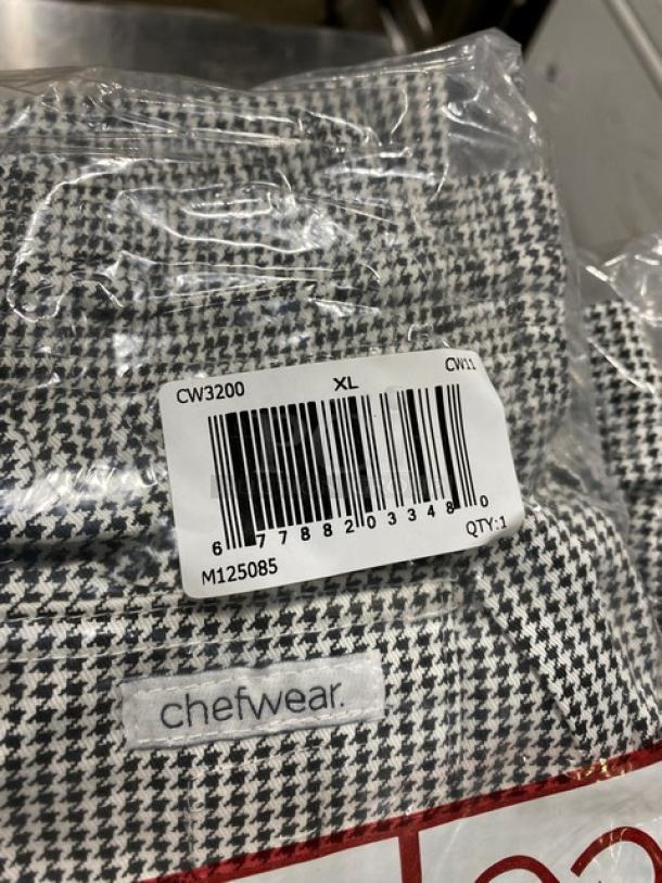 NEW Chefwear XL chef pants, model CW3200CW11, in black and white, sealed packaging with barcode label.