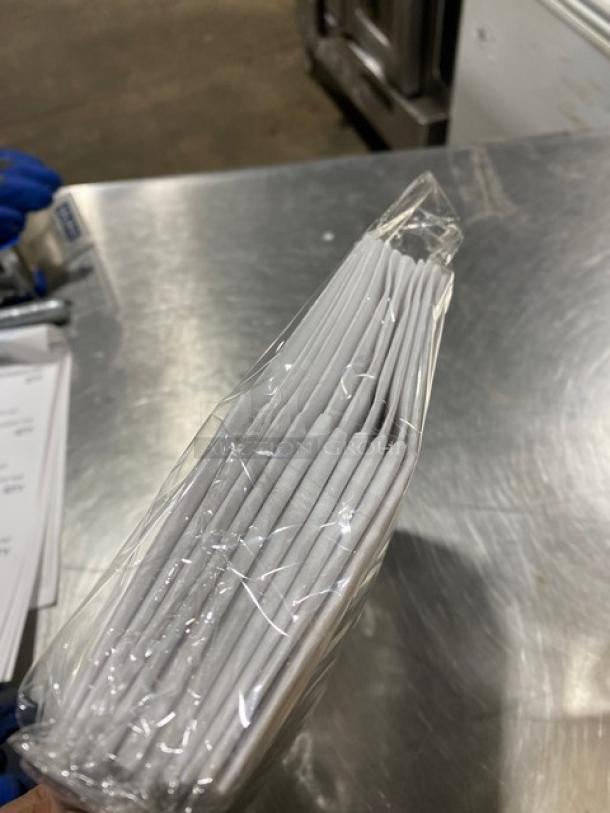 New Landau Uniforms 9" round chef hat in white, non-woven material, packaged. Ideal for commercial use.