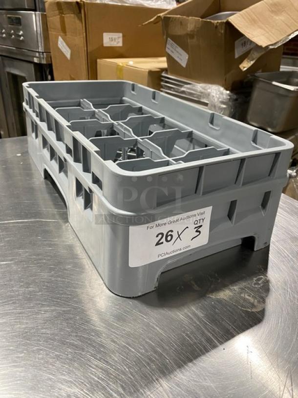 Cambro Commercial Gray Half Size Dishwashing Rack, Model HBR258, 10 compartments, labeled for auction, on metal surface.