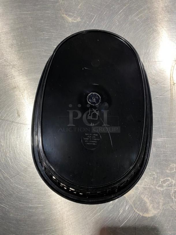 Tablecraft black oval Chicago platter basket, model 1076BK, shown on a metallic surface. New condition.