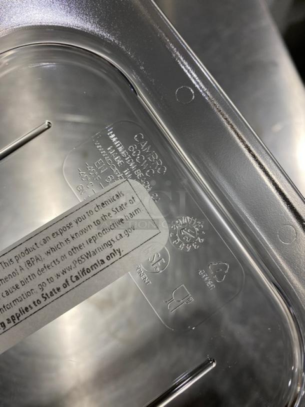 Clear polycarbonate food pan cover, Cambro Camwear Series, model 60CWC135. Features etched branding and safety warnings. Mint condition.