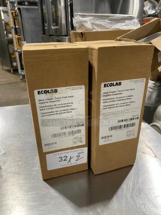 Ecolab Nexa Series touch-free hand hygiene dispensers in original packaging, new condition, labeled for commercial use.