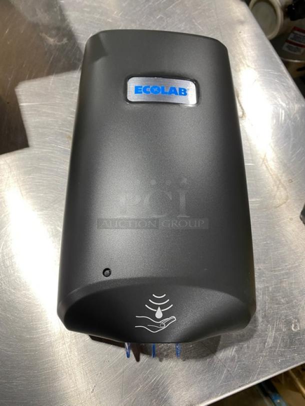 Ecolab Nexa Series black touch-free hand hygiene dispenser, new condition, sleek design with Ecolab logo.