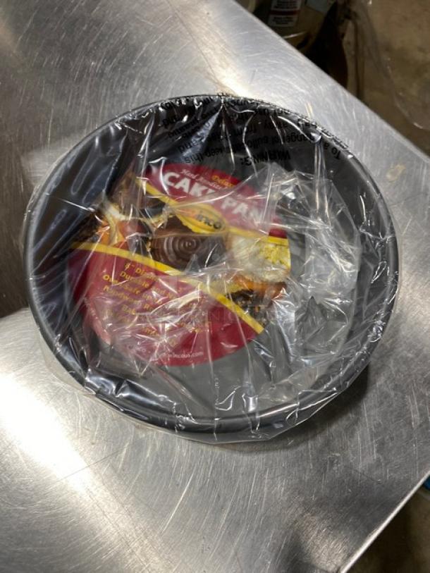 Winco 8" anodized aluminum cake pan, model HAC-082, new in packaging with label. Perfect for commercial baking.