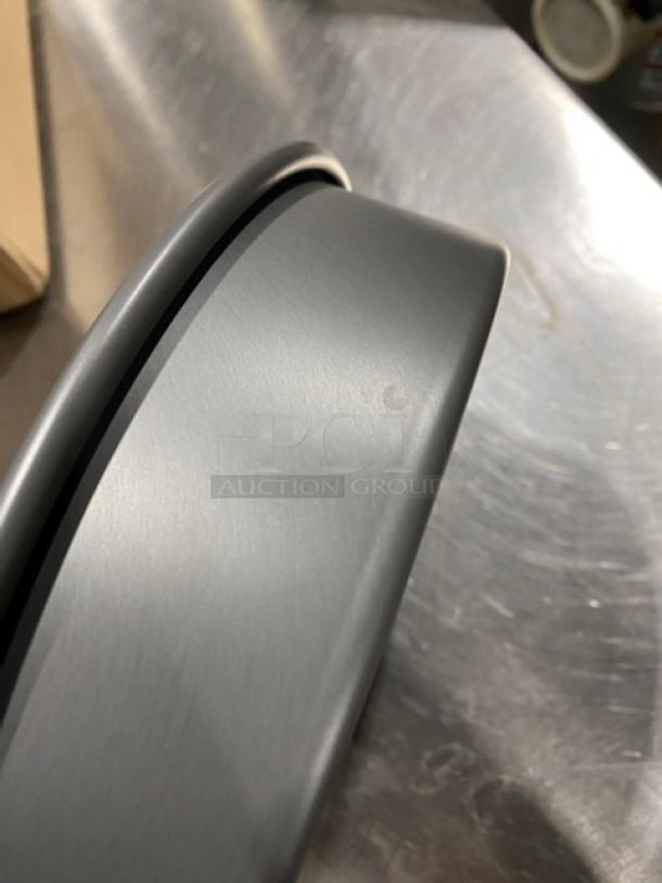 Winco HAC082 8"x2" anodized aluminum round cake pan, new condition. Smooth finish, durable commercial quality.