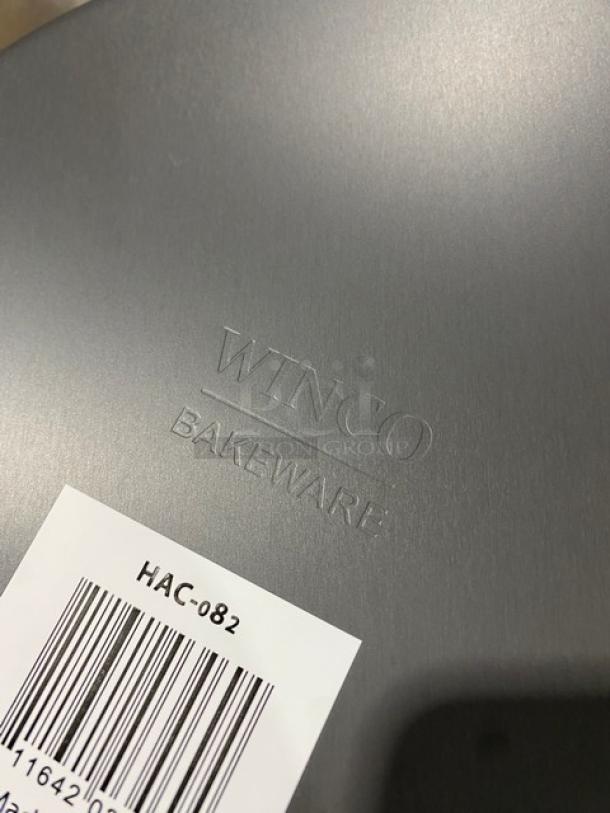 Winco HAC082 cake pan, 8"x2", anodized aluminum, new condition, labeled "Winco Bakeware" with model tag.