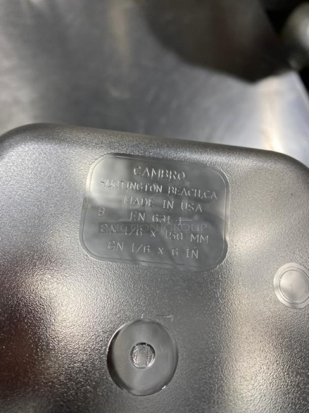 NEW Cambro Camwear clear polycarbonate food pan, 1/6 size, 6" deep. Model: CW-CLRCW. Made in USA, embossed details visible.