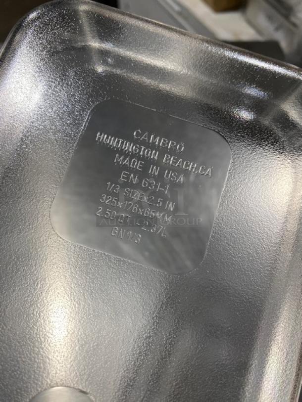 Cambro Camwear 32CW135 clear polycarbonate 1/3 size food pan, 2" deep, new condition, markings show size and capacity.
