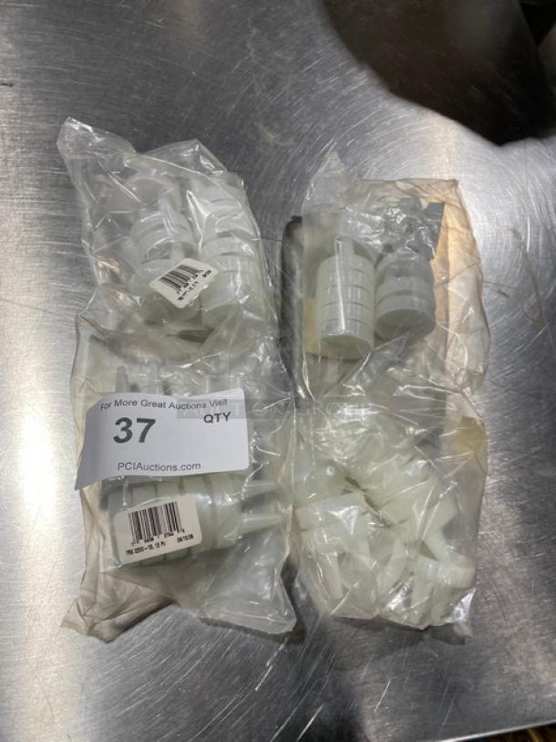 Traex Commercial Clear Double Tip Condiment Lids, Model TRX2200-13, in sealed packaging marked with quantity and auction details.