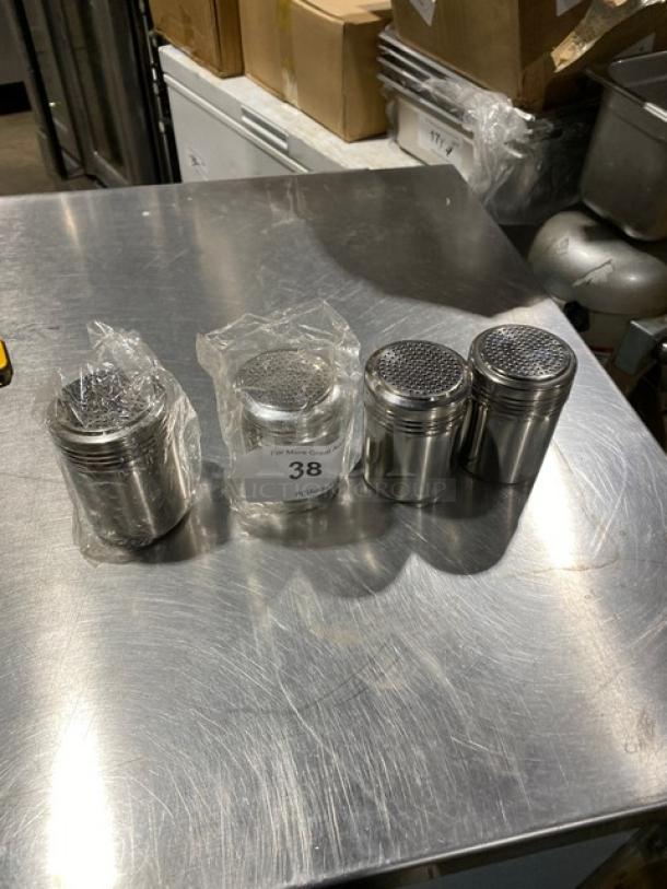 NEW ABC SSD-12 stainless steel 10 oz dredge/shaker, set of four. Features perforated lids, pristine condition, ideal for commercial use.